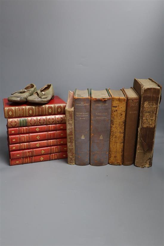 Assorted bindings and a pair of childs shoes